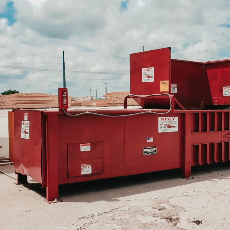 commercial trash compactor for commercial trash services in central kansas icon photo