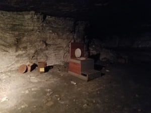 old portable toilet in a mine 300x225